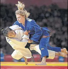  ?? REUTERS ?? Tababi Devi Thangjam (in white) in action against Ana Viktorija Puljiz at the Youth Olympics in Buenos Aires. Mehuli Ghosh (right) had topped qualifying.