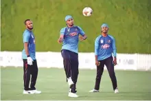  ?? Virendra Saklani/Gulf News ?? Bangladesh players Shakib Al Hassan and Mashrafe Mortaza during a practice session at the ICC Cricket Academy ground in Dubai.