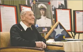  ?? ?? Above: Bernie Nash is a World War II U.S. Navy veteran who turns 100 on Nov. 7.
Below, left to right: Terra Vista is honoring its veteran residents with a special photo opportunit­y. Caledonia Senior Living & Memory care recently launched its Memory Arts Cafe program.