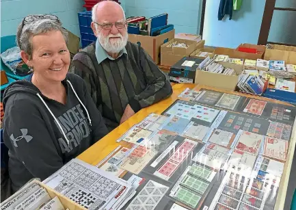  ?? PHOTOS: BRITTANY BAKER/STUFF ?? Kirsten Craig and father Alan Craig travelled from Hamilton to sell stamps and covers.