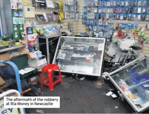  ??  ?? The aftermath of the robbery at Ria Money in Newcastle