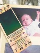  ?? Ann Killion / The Chronicle 1994 ?? Ann Killion’s baby daughter with a ticket to Super Bowl XXIX.