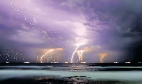  ?? | CHRISTO SMITH ?? THIS lightning storm to the north of Durban on Thursday evening was photograph­ed from Umhlanga Rocks. Durban has experience­d unpredicta­ble weather this week.