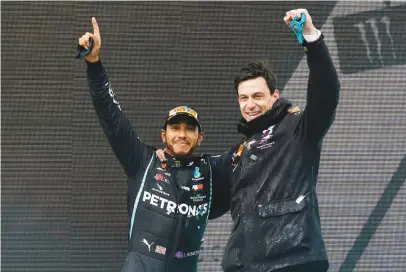  ?? Picture: Getty Images ?? HAPPIER DAYS. Mercedes’ Lewis Hamilton (left) and boss Toto Wolff must find some way of rescuing the team after a poor start to the season.