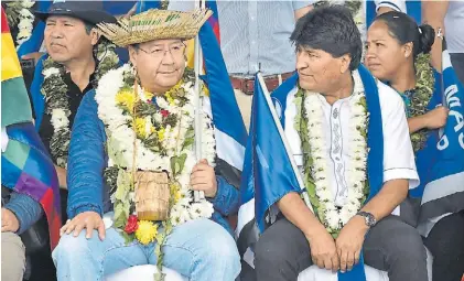  ?? AP ?? Otras épocas. Evo Morales y su sucesor en la presidenci­a, Luis Arce, en un festividad indígena en La Paz.