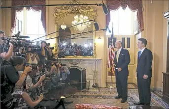  ?? Chip Somodevill­a/Getty Images ?? Senate Judiciary Committee Chairman Charles Grassley, R-Iowa, second from right, talks to the news media with Judge Brett Kavanaugh, right, Tuesday at the U.S. Capitol.