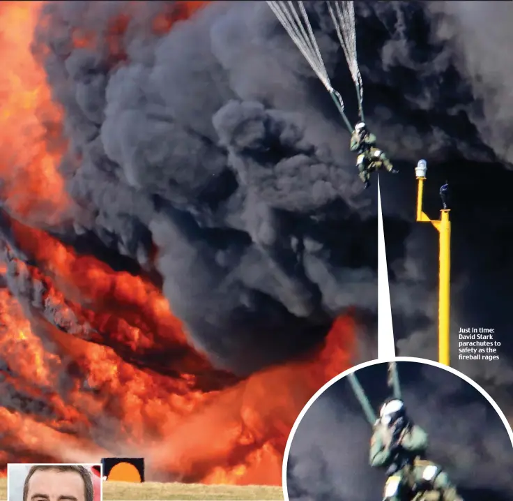  ??  ?? Just in time: David Stark parachutes to safety as the fireball rages