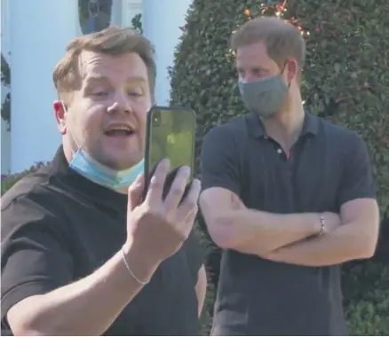  ??  ?? Revelation­s:
James Corden talks to Meghan on the phone as Harry looks on during the interview