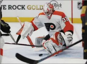  ?? JOHN LOCHER – THE ASSOCIATED PRESS ?? Flyers goalie Brian Elliott makes a save in the second period Thursday night in what became a 5-2 season-opening road victory over the Vegas Golden Knights.