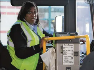  ?? CORNELIUS FROLIK / STAFF ?? Teresa Alexander has been a bus driver with Greater Dayton Regional Transit Authority for more than 20 years. The RTA is trying to become the first major transit authority in the United States to get rid of cash fares.