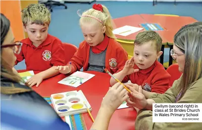  ?? ROB BROWNE ?? Gwilym (second right) in class at St Brides Church In Wales Primary School