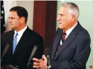  ?? ASSOCIATED PRESS PHOTO BY ROSS D. FRANKLIN ?? Former Sen. Jon Kyl, R-Ariz., right, speaks at a news conference in Phoenix on Tuesday after Arizona Gov. Doug Ducey, left, announced Kyl will fill John McCain’s seat in the U.S. Senate for the remainder of the year.