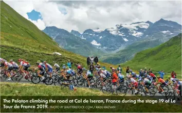  ?? PHOTO BY SHUTTERSTO­CK.COM / RADU RAZVAN ?? The Peloton climbing the road at Col de Iseran, France during the stage 19 of Le Tour de France 2019.