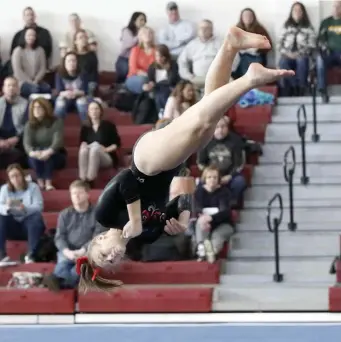  ??  ?? GRAVITY OF MOMENT: Reading’s Rachel Spazzaferr­o performs her floor routine during the North Sectional Championsh­ips.