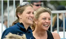  ?? STUFF ?? Silver Ferns star Irene van Dyk, right, shows support for netball team-mate Anna Scarlett at a beach volleyball event in Wellington in 2006.