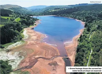  ?? Matthew Horwood ?? > Drone footage shows the current low water levels at Llwyn-on reservoir