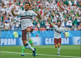  ?? Associated Press ?? Vamos: Mexico's Carlos Vela celebrates after scoring the opening goal against South Korea in the Rostov Arena in Rostov-on-Don, Russia, Saturday.