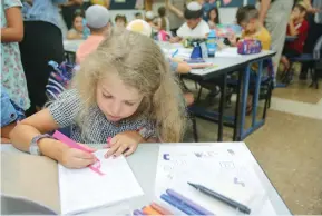  ?? (Marc Israel Sellem/The Jerusalem Post) ?? MORE THAN 2.3 million Israeli students end their two-month summer break today.