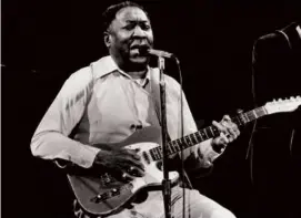  ?? GLOBE FILE 1980 ?? Muddy Waters, at a Berklee Performanc­e Center jazz festival in 1980. He died three years later, at age 68.