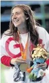  ??  ?? Dame Sarah Storey, Sophie Thornhill and Libby Clegg celebrate their gold medal wins on the podium in Rio