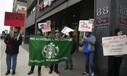  ?? Photograph: Barbara J Perenic/AP ?? Starbucks workers join a national strike Thursday in downtown Columbus, Ohio.