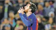  ?? ALBERT GEA / REUTERS ?? Lionel Messi celebrates scoring in Barcelona’s 4-0 win over Borussia Monchengla­dbach on Tuesday.