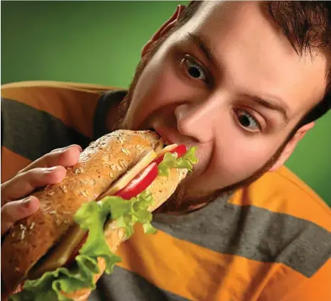  ?? PHOTO: ISTOCK ?? SLOW DOWN: Eating too quickly overrides mechanisms which tell our brains we’re full.