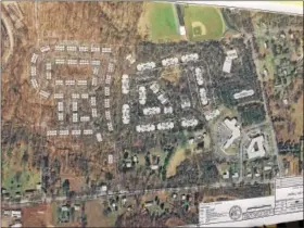  ?? DIGITAL FIRST MEDIA FILE PHOTO ?? The site plan for Sanatoga Green superimpos­ed over an aerial photo of the 51-acre site.