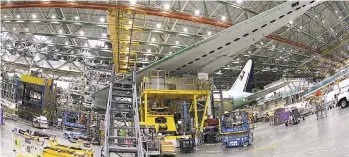  ?? AP ?? In this June 12, 2017 file photo, a Boeing 777 plane is on the assembly line in Everett, Washington.