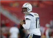  ?? JOSIE LEPE — ASSOCIATED PRESS ?? Chargers quarterbac­k Philip Rivers warms up before the team’s preseason game with the 49ers in Santa Clara, Calif., on Thursday.