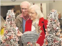  ??  ?? Cancer care charity Maggie’s held a Christmas fair at The Double Tree by Hilton in Charlton Kings. Pictured below, Lyn Ricketts and Rachel Norton. Pictures: Daniel Day