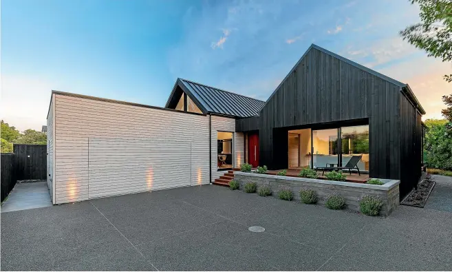  ??  ?? There was an uncompromi­sing approach to quality in the design and build of this highly specified home, which has used the enduring beauty of cedar in its cladding, solid American oak and teak joinery.