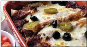  ?? (Arkansas Democrat-Gazette/Kelly Brant) ?? Tex-Mex Cheese Enchiladas