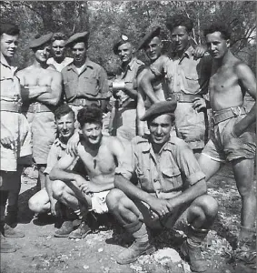  ?? SUBMITTED PHOTO ?? George Burke, second from left, in Italy on May 11, 1944.