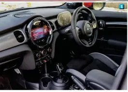  ??  ?? 1.The red-stitching on black Alcantara on the JCW looks absolutely incredible, but its racing bucket seats set it apart.