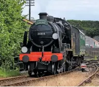  ?? JAMES TAVINER ?? Swanage Railway ‘U-boat’ No. 31806 departs the branch’s seaside terminus with its third and final trial run of the day on July 11, ahead of its re-entry into service the following week.