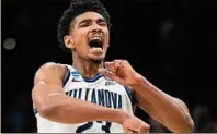  ?? David J. Phillip / Associated Press ?? Villanova forward Jermaine Samuels celebrates after a win against Houston on Saturday that puts the Wildcats into the Final Four. He had 16 points and 10 rebounds.