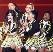  ?? — AP ?? Camila Cabello (left) performs on stage during the Global Awards 2020 in London on Thursday.