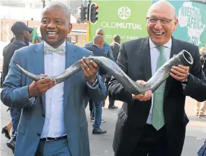  ?? /Freddy Mavunda ?? Fanfare: Peter Moyo, CEO of Old Mutual Holdings, left, and Trevor Manuel, chairman of Old Mutual, at the listing event for Old Mutual at the JSE in Sandton.