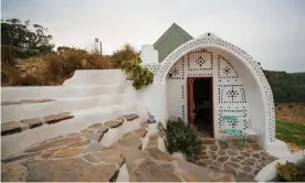  ?? Photograph: James Field Photograph­y ?? Martin Freney’s earthship B&B in Ironbark, South Australia, is made with recycled tyres, glass bottles and aluminium cars.