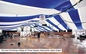  ??  ?? The new Christmas village at Times Square, Newcastle, takes shape
