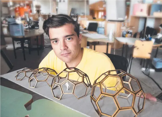  ?? Picture: SUPPLIED ?? Bond University architectu­re student Nelson Michaels with a Breatheblo­cks model.