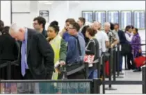  ?? AP FILE PHOTO/WILFREDO LEE ?? Air travelers can expect lines like this one, AAA Mid-Atlantic says in its annual Thanksgivi­ng holiday travel report.