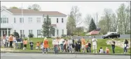  ?? Scott Mullin / For Hearst Connecticu­t Media ?? Junior Newtown Action Alliance Club, from Newtown High School, holds a student protest at National Shooting Sports Foundation in Newtown on May 5.