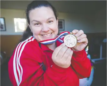  ?? GERRY KaHRMANN ?? Christine Girard, who was inducted into the Canadian Olympic Hall of Fame on Monday, says she’s “humbled. I’m really honoured” to be entering the shrine with a group of people that she admires.