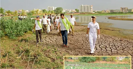  ??  ?? BREATHING LIFE: IAS officer and District Collector of Mancherial, R. V. Karnan not only ‘ rescued’ a 48- acre heritage lake from being encroached but also started an awareness campaign to show how the tank can help store rainwater while saving colonies...