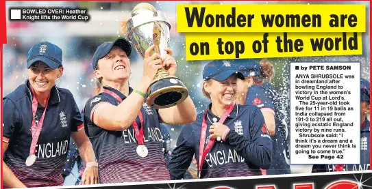  ??  ?? BOWLED OVER: Heather Knight lifts the World Cup