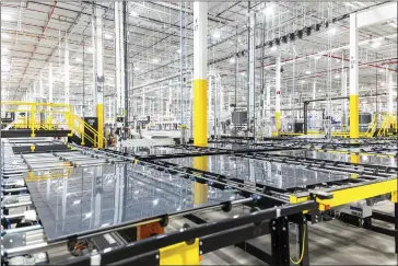  ?? DANIEL LOZADA — THE NEW YORK TIMES ?? Some Biden administra­tion officials are concerned that a flood of low-priced Chinese imports could threaten the survival of U.S. factories, such as this solar panel factory in Perrysburg, Ohio, and others throughout the country.