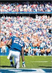  ?? Bryan Bennett Getty Images ?? THE BILLS’ LeSean McCoy, kneeling during the anthem, said the president was “acting like a jerk.”