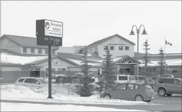  ?? Colleen De Neve/calgary Herald ?? Officials say they are still unsure of how a Grade 3 student was nearly strangled in the washroom at Bearspaw School. The eight-year-old boy remains in critical condition at Alberta Children’s Hospital.